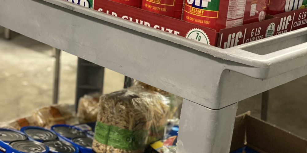 A cart full of food that was donated at the end of the day.